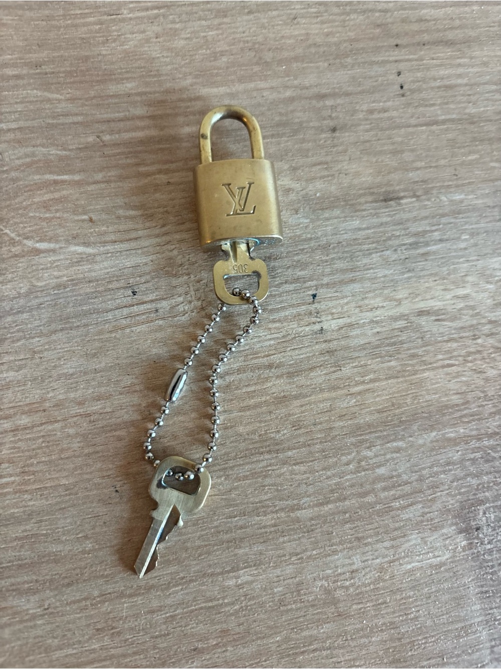 Authentic Louis Vuitton lock and key set